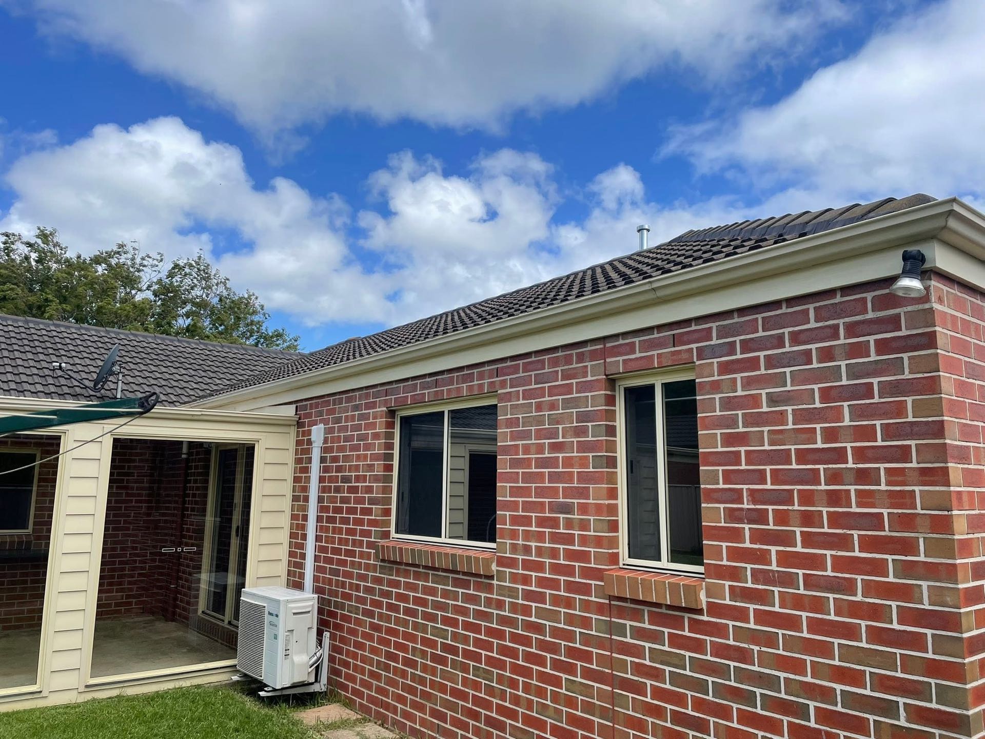 Clean gutters and tidy roofline on a brick home in Warrnambool